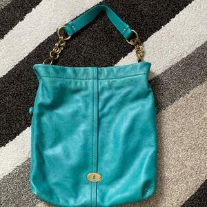 Nicely worn-in cowhide leather Fossil purse.